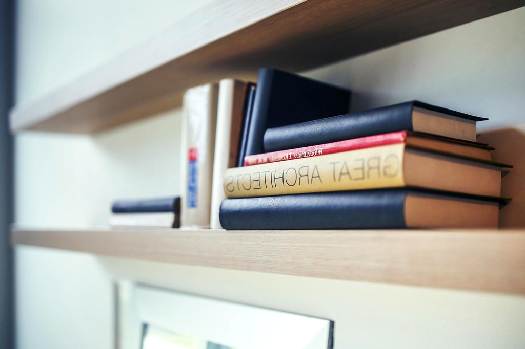 Person setting goals on a digital planner app with progress charts